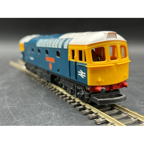 51 - Four Lima Boxed Diesel/Electric Locomotives Tested Runners
(2000g)
Lima L205229 Class 31 BR Research... 