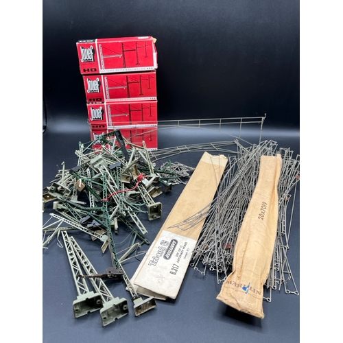 77 - Job Lot of HO/OO Catenary Supports and Wires from Jouef, Marklin and triangles Railways
(2000g)
Imag... 