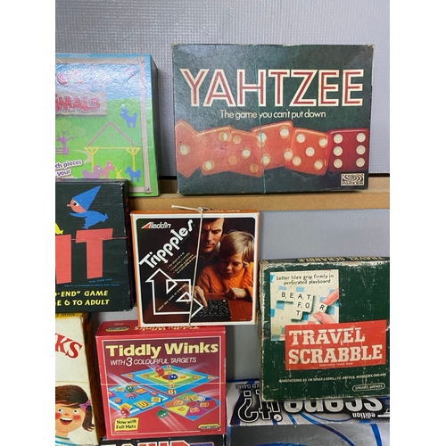 365 - 12 Vintage Board Games including.
(7300g)
Yahtzee, Travel Scrabble, Scene It, Countdown, Battleship,... 