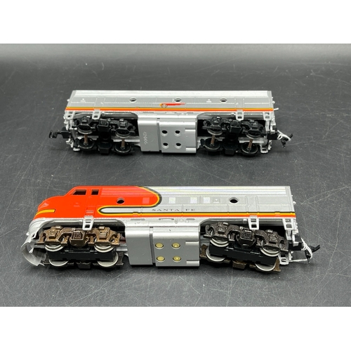 130 - Four HO North American Outline Locomotives, three tested Runners
(1600g)
Santa Fe AT&SF F7A/B set, p... 