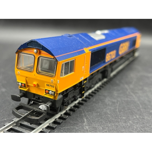 244 - Three Boxed OO Lima Diesel/Electric Locomotives, each Tested Runners
(1400g)
Lima L204966 Class 66 d... 