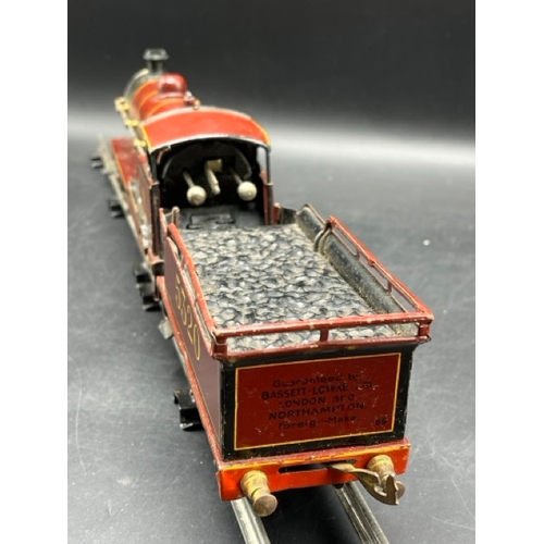 114 - Bing for Bassett-Lowke red LMS 'George V' 4-4-0 loco and tender No. 5320 Clockwork with three Basset... 