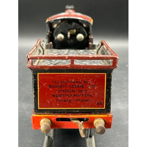 114 - Bing for Bassett-Lowke red LMS 'George V' 4-4-0 loco and tender No. 5320 Clockwork with three Basset... 