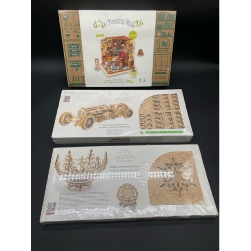 34 - 3 New & Sealed Wooden Model Kits. (2600g)
UGEARS Model Mechanical Flower.
UGEARS Model U9 Grand Prix... 