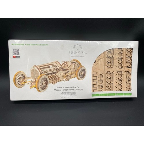 34 - 3 New & Sealed Wooden Model Kits. (2600g)
UGEARS Model Mechanical Flower.
UGEARS Model U9 Grand Prix... 