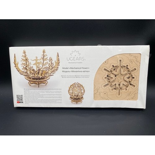 34 - 3 New & Sealed Wooden Model Kits. (2600g)
UGEARS Model Mechanical Flower.
UGEARS Model U9 Grand Prix... 