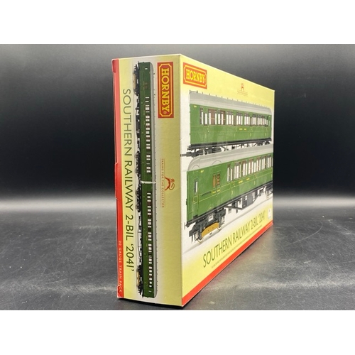 32 - Hornby R3161AX Class 401 2-BIL 2-car EMU 2041 in SR green livery. DCC fitted
(750g)
Boxed and appear... 