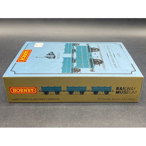 196 - Two Hornby Coach/Wagon packs 'As New'
(350g)
Hornby R60014 4 wheel Liverpool and Manchester Railway ... 