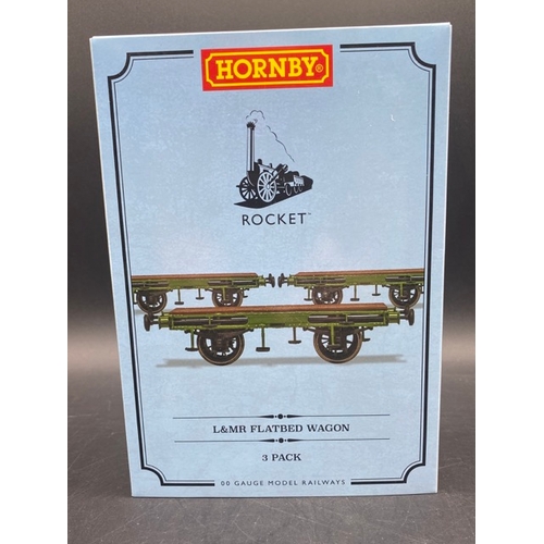 196 - Two Hornby Coach/Wagon packs 'As New'
(350g)
Hornby R60014 4 wheel Liverpool and Manchester Railway ... 