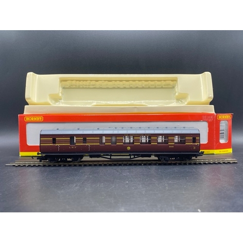 229 - Three OO gauge Hornby LMS coaches, appear un-used
(650g)
Hornby R4141 LMS Maroon (Coronation) Compos... 