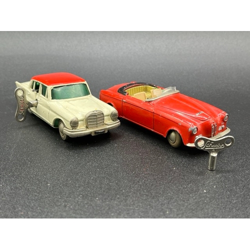 257 - Two Schuco Micro Racers
(300g)
Schuco Micro Racer 1038 Mercedes 220S with key - Operation not perfec... 