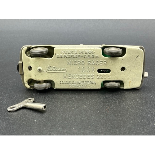 257 - Two Schuco Micro Racers
(300g)
Schuco Micro Racer 1038 Mercedes 220S with key - Operation not perfec... 