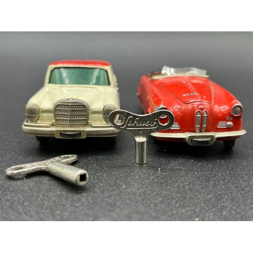 257 - Two Schuco Micro Racers
(300g)
Schuco Micro Racer 1038 Mercedes 220S with key - Operation not perfec... 