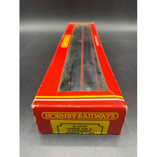 233 - Six Hornby OO gauge boxed coaches 'Ready-to-Roll'
(850g)
Hornby R4076 Mk4 RSB restaurant standard bu... 