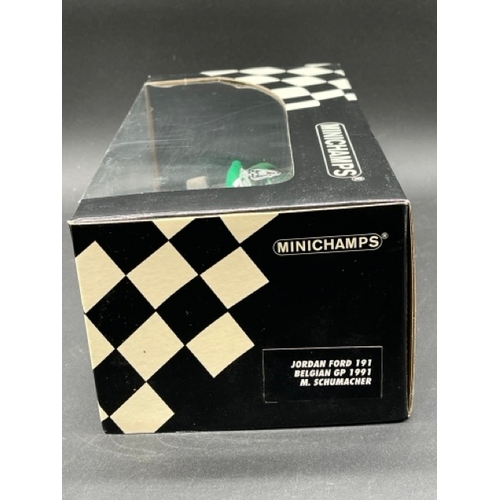 296 - Three Minichamps (Paul's Model Art) Schumacher F1 Racing Cars 1/18 scale
(2500g)
Jordan Ford 191 Bel... 