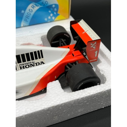 299 - LANG McLaren MP 4/6 Ayrton Senna 1/18 scale in box with display stand
(1100g)
