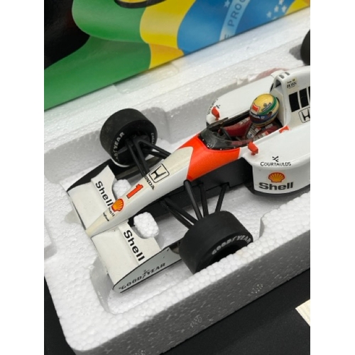 299 - LANG McLaren MP 4/6 Ayrton Senna 1/18 scale in box with display stand
(1100g)
