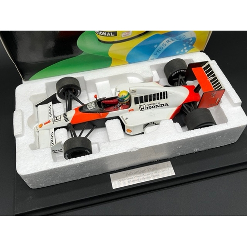 301 - LANG McLaren MP 4/5 Ayrton Senna 1/18 scale in box with display stand
(1100g)
