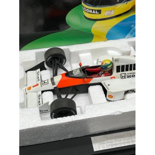 301 - LANG McLaren MP 4/5 Ayrton Senna 1/18 scale in box with display stand
(1100g)
