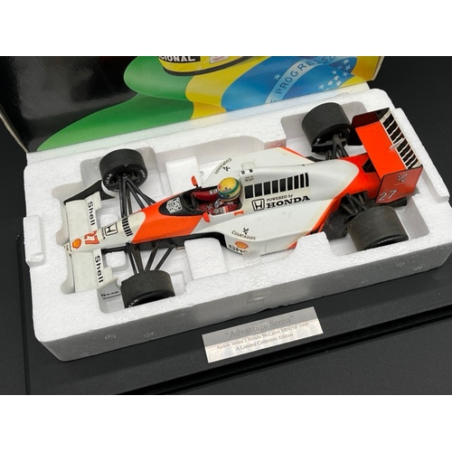 302 - LANG McLaren MP 4/5B Ayrton Senna 1/18 scale in box with display stand
(1100g)
