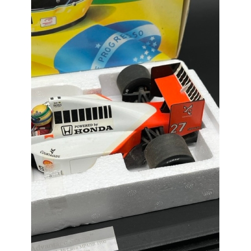 302 - LANG McLaren MP 4/5B Ayrton Senna 1/18 scale in box with display stand
(1100g)
