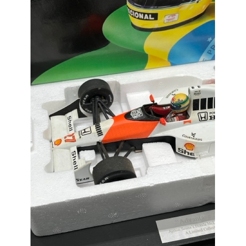 302 - LANG McLaren MP 4/5B Ayrton Senna 1/18 scale in box with display stand
(1100g)
