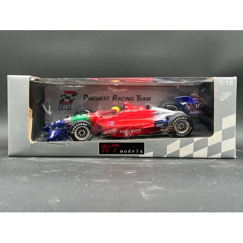 297 - Two Minichamps 1/18 Indy Racing Cars
(1200g)
Minichamps 520 934405 LOLA FORD die cast model Indy car... 