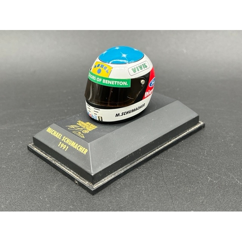 298 - 13 Minichamps 1/8 scale Michael Schumacher drivers Helmets spanning 1989 to 1998, plus two Hot Wheel... 