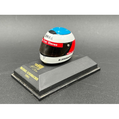 298 - 13 Minichamps 1/8 scale Michael Schumacher drivers Helmets spanning 1989 to 1998, plus two Hot Wheel... 