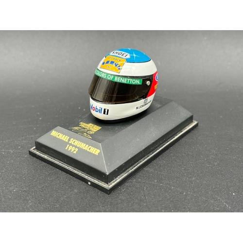 298 - 13 Minichamps 1/8 scale Michael Schumacher drivers Helmets spanning 1989 to 1998, plus two Hot Wheel... 