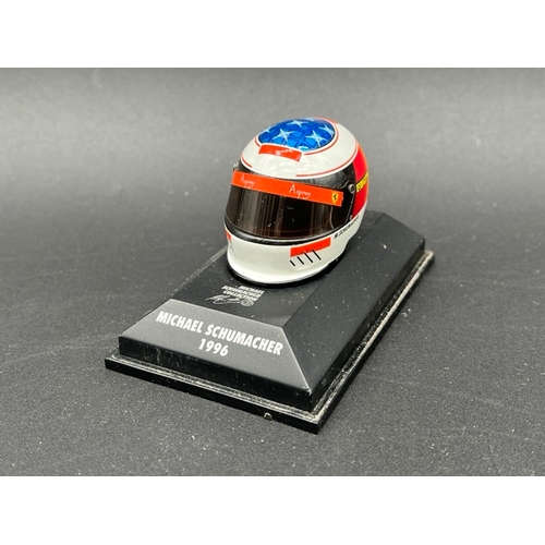 298 - 13 Minichamps 1/8 scale Michael Schumacher drivers Helmets spanning 1989 to 1998, plus two Hot Wheel... 