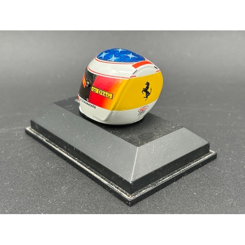 298 - 13 Minichamps 1/8 scale Michael Schumacher drivers Helmets spanning 1989 to 1998, plus two Hot Wheel... 