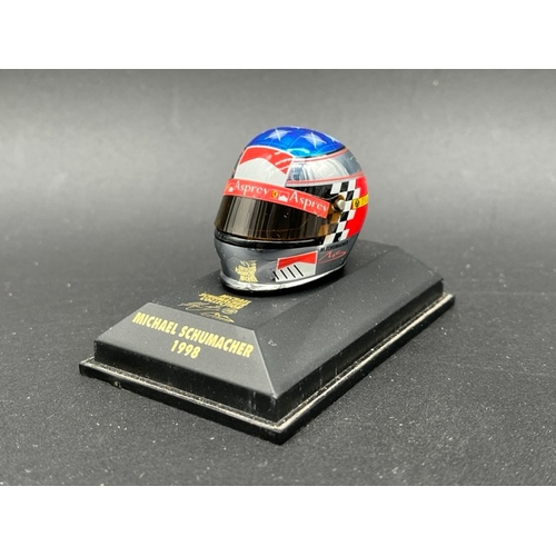 298 - 13 Minichamps 1/8 scale Michael Schumacher drivers Helmets spanning 1989 to 1998, plus two Hot Wheel... 