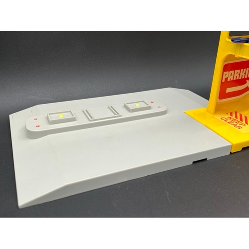 261 - Corgi Juniors 3002 Garage Centre in box 'Corgi Sky Park'
(1300g)
Appears to be missing two petrol pu... 