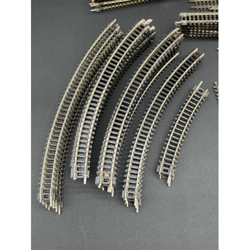 237 - A quantity of N gauge Peco/Bachmann previously used track
(700g)
Over 90 pieces, including five poin... 