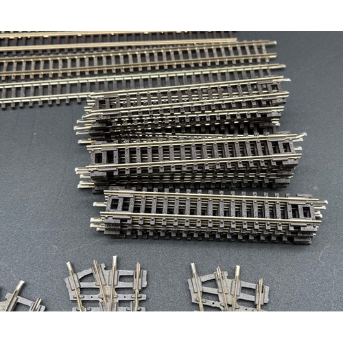 237 - A quantity of N gauge Peco/Bachmann previously used track
(700g)
Over 90 pieces, including five poin... 