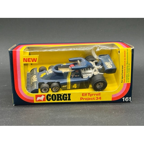 263 - Six Corgi and a Dinky F1 boxed racing cars with
(2300g)
two Universal F1 cars, four Shell Sports Car... 