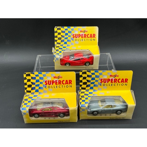 263 - Six Corgi and a Dinky F1 boxed racing cars with
(2300g)
two Universal F1 cars, four Shell Sports Car... 