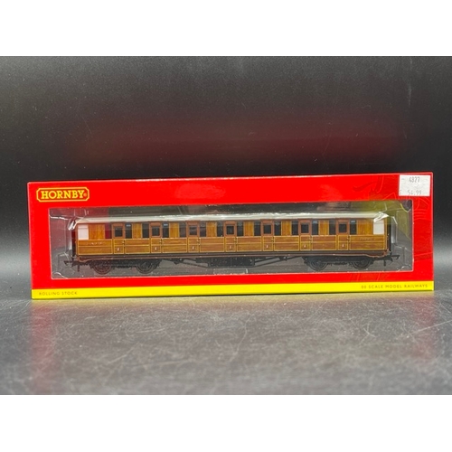 394 - Four OO gauge Hornby LNER Teak boxed coaches 'Ready-to-Roll'
(800g)
Appearing 'As New'
Hornby R4826 ... 