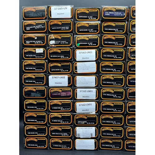 396 - 77 OO gauge Mainline Rolling stock wagons and vans each boxed
(5400g)
includes:- 
Cattle wagons (11)... 