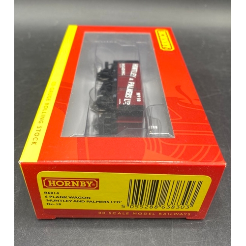 406 - 14 Bachmann and Hornby boxed OO gauge Rolling stock
(1200g)
Hornby R6814 Six plank open wagon 