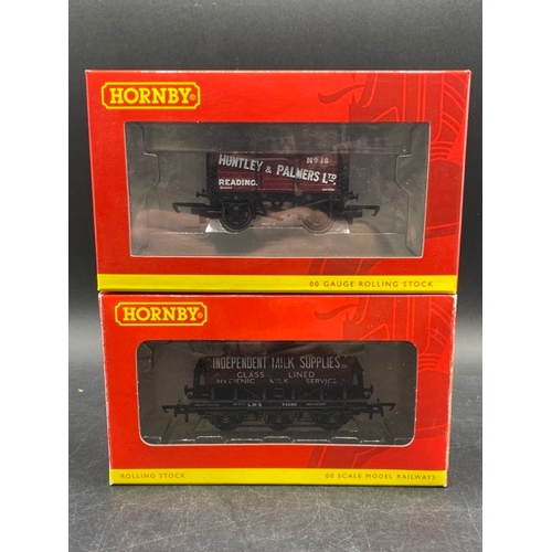 406 - 14 Bachmann and Hornby boxed OO gauge Rolling stock
(1200g)
Hornby R6814 Six plank open wagon 