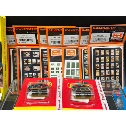 114 - A Job Lot of Sealed un-used OO gauge model railway kits, track components and two Hornby Point motor... 