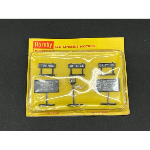 83 - Hornby Dublo 5037 Lineside Notices (un-punched) in original undisturbed packaging, together with thr... 