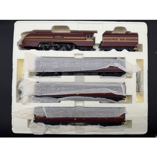 195 - Hornby R2199M 'The Coronation Scot' Limited Edition Train Pack. Containing 4-6-2 LMS maroon and gold... 