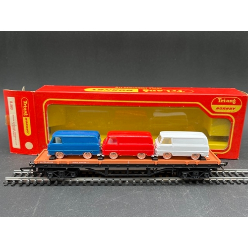 99 - Very original condition and un-used Triang R563 Bogie Bolster Wagon with three Minix Ford Vans, toge... 