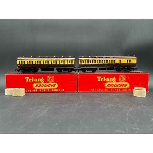 104 - 13 Boxed Triang Rolling stock with 3 OO Graham Farish packaged Brown/Cream coaches, plus others
(380... 