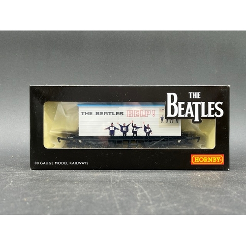 427 - Set of 4 Hornby 'The Beatles' LWB Van Rolling stock OO gauge
(450g)
Hornby R60008 The Beatles Sgt. P... 