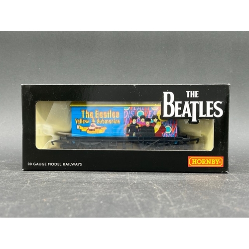 427 - Set of 4 Hornby 'The Beatles' LWB Van Rolling stock OO gauge
(450g)
Hornby R60008 The Beatles Sgt. P... 