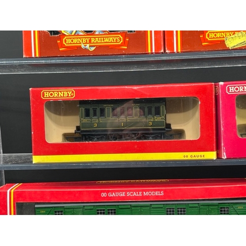 429 - OO gauge 14 Boxed Hornby Rolling stock, with five Hornby wagons/tanks
(1500g)
'Ready to Roll'